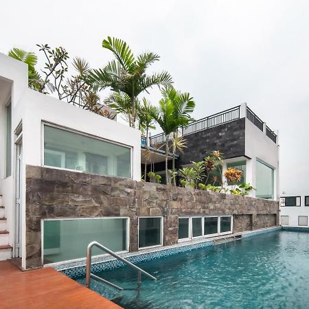 Aparthotel Cove Taman Giacarta Esterno foto